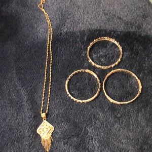 4 piece gold toned jewelry set
